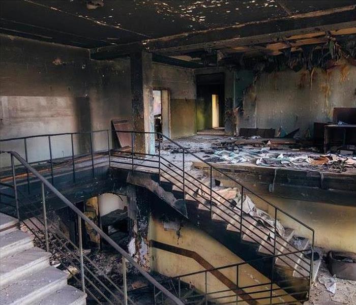 A burned-out interior of an office, stairwell and lobby
