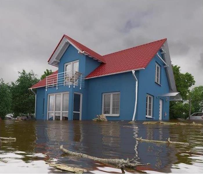 A house is surrounded by flood water